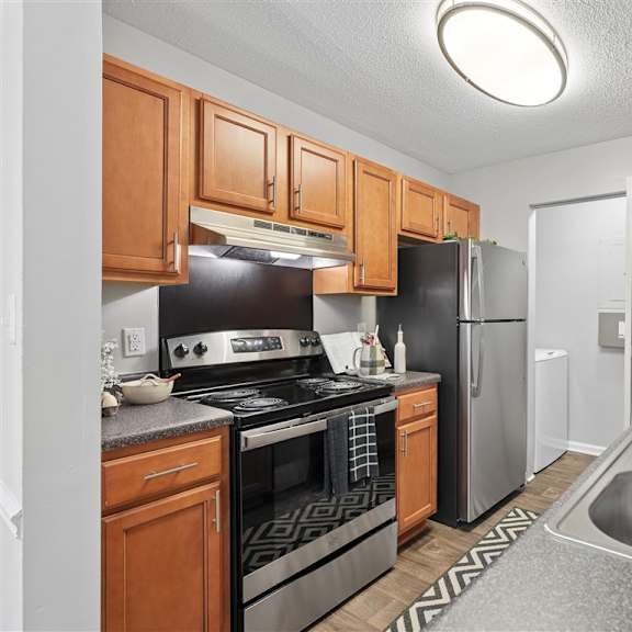 apartment kitchen with modern cabinetry and appliances at park ridge estates