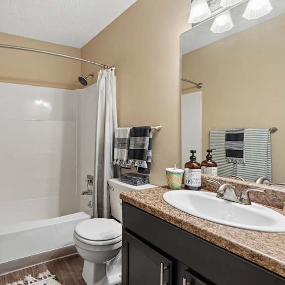 bathroom area at the grove at lyndon apartments louisville ky