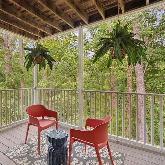 private apartment patio with wooded views at park ridge estates
