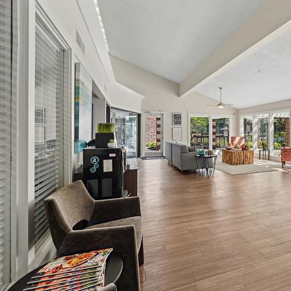 modern lounge area at the grove at lyndon apartments in louisville, ky