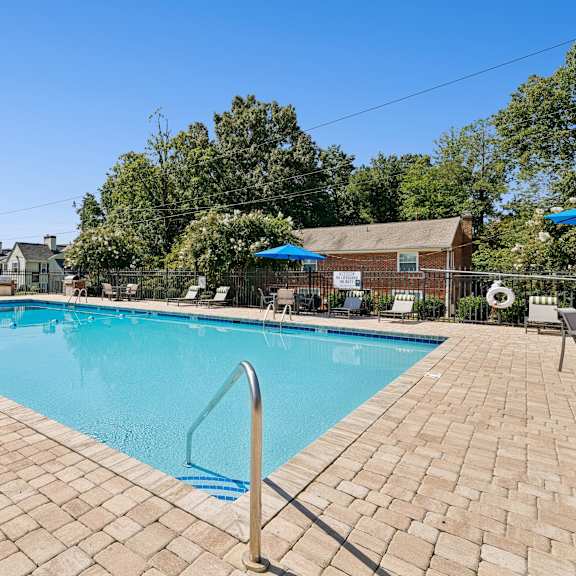 sparkling swimming pool and sundeck at hyde park apartment & townhomes chester, va 23831