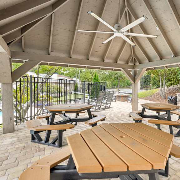 outdoor pergula & picnic area shaded with outdoor seating at park ridge estates in durham, nc