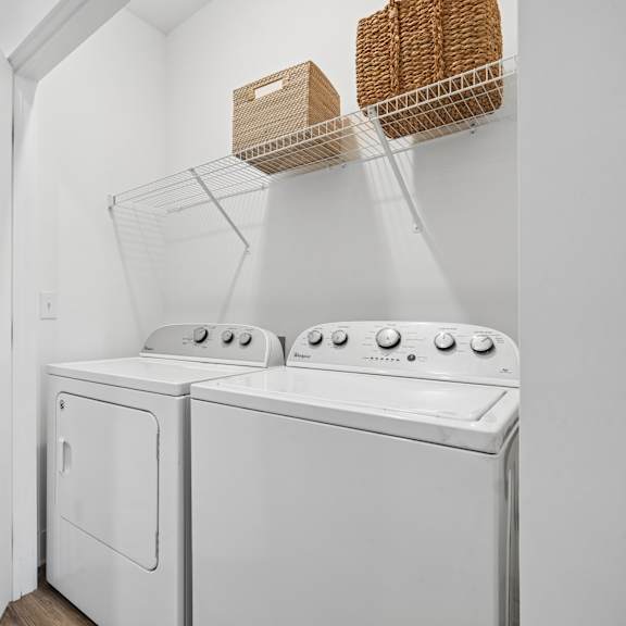 laundry room with a washer and dryer.