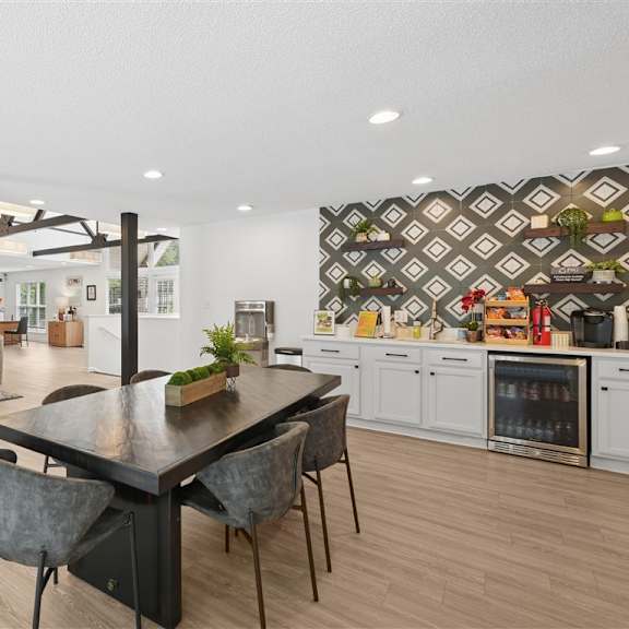 community clubhouse kitchen and dining area at park ridge estates in durham, nc