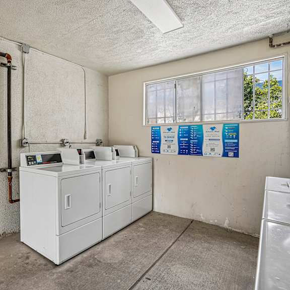 a laundry room with a washer and dryer.