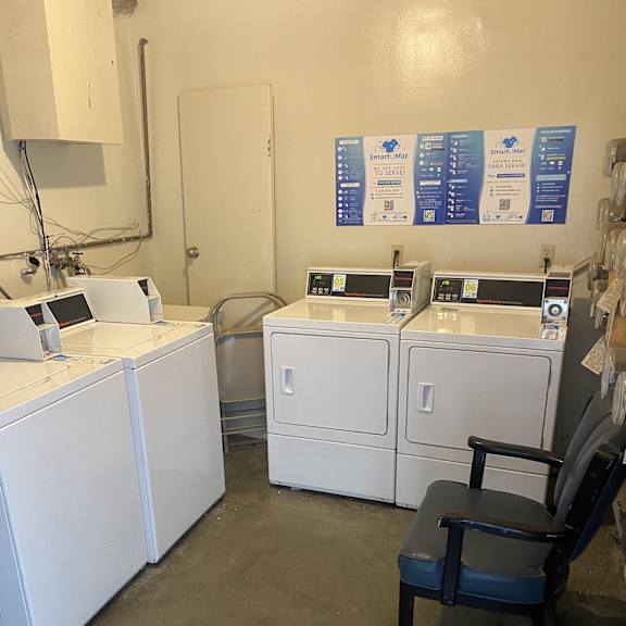 a room with a chair and some machines.