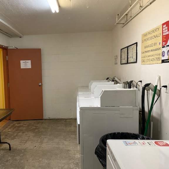 a laundry room with a washer and dryer.