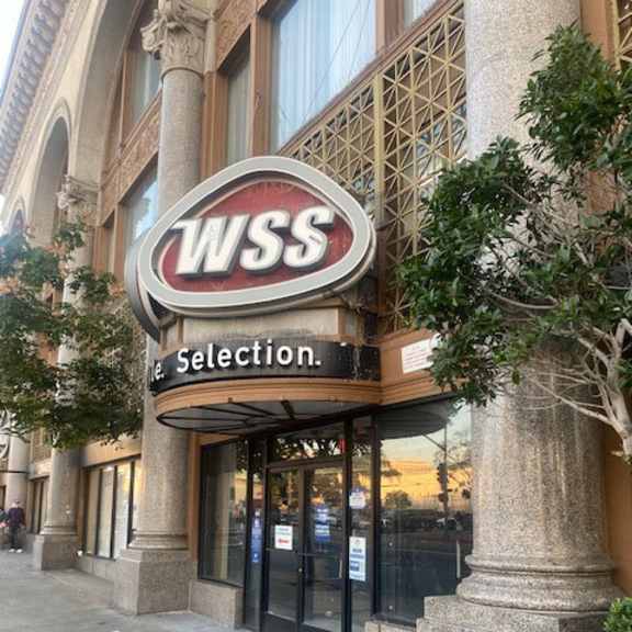 a wss selection storefront with a red and white sign.