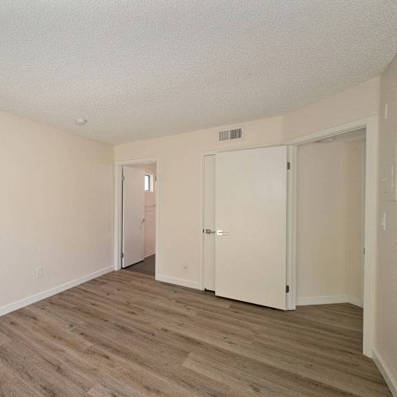 apartment home bedroom with closet at croft plaza apartments, california