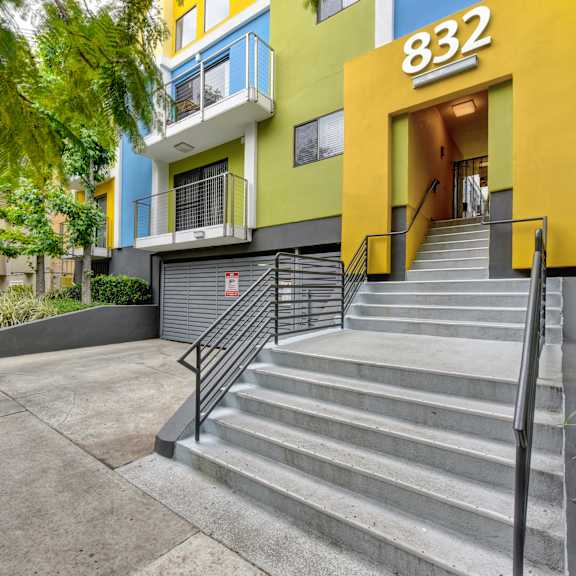 stairway to the community entrance. at the top of the entrance are the numbers 832.at croft plaza apartments, california, 90069