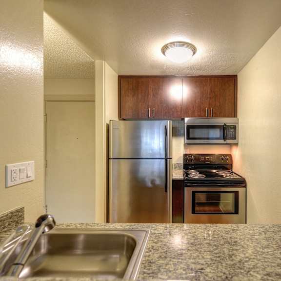kitchen with granite countertops at the retreat at walnut creek, california, 94596