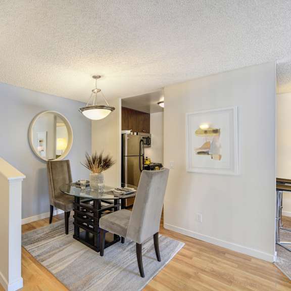 a dining room with a table and chairs at the retreat at walnut creek, walnut creek, ca, 94596
