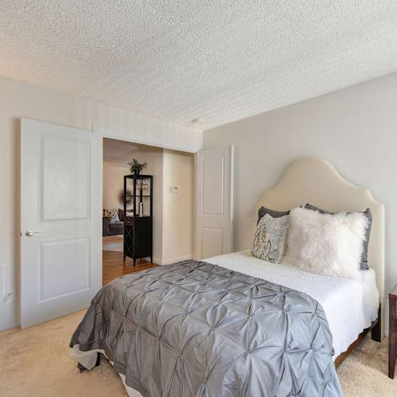 a bedroom with a bed and a nightstand at the retreat at walnut creek, california