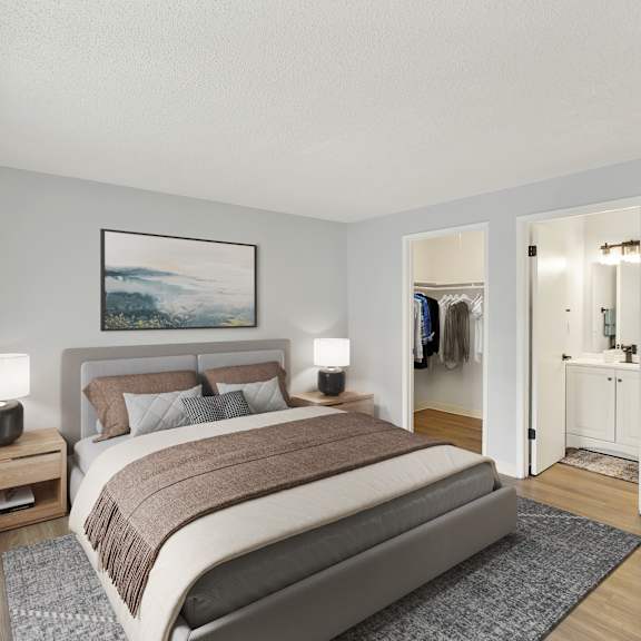 Thumbnail 3 of 13 A bedroom with a large bed and a painting on the wall.