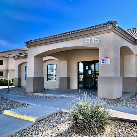 the image shows a building with the number 915 on it.
