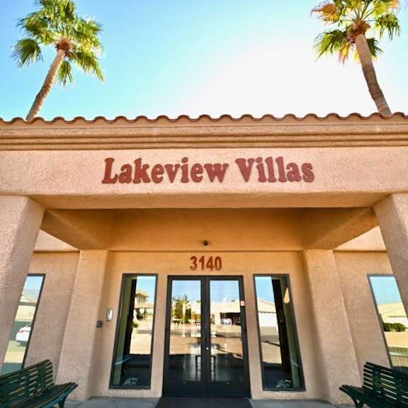 the front of a building with the name lakeview villas and the number 3140 on it.