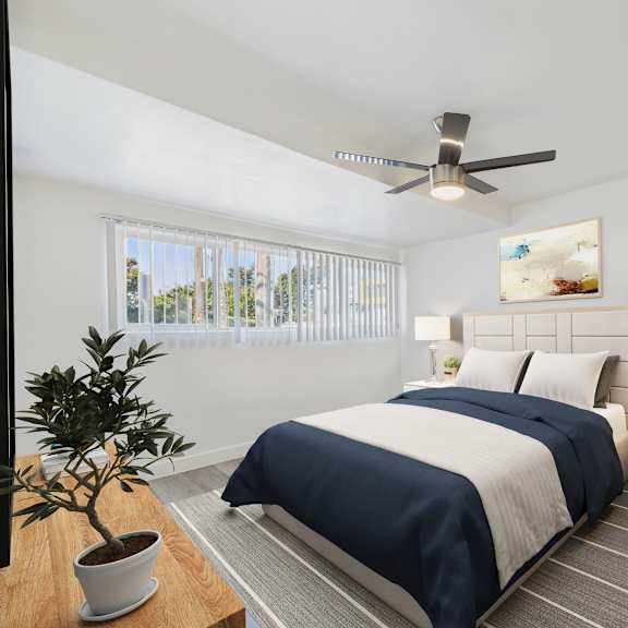 a bedroom with a bed, nightstand, and a ceiling fan.