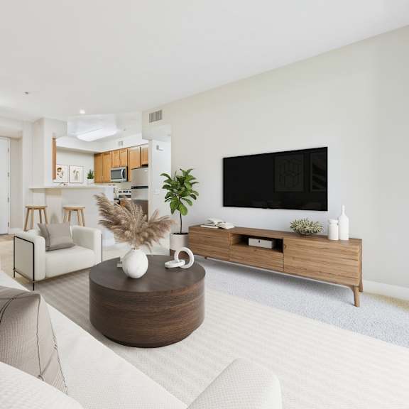 a modern living room with a white sofa and a wooden coffee table.