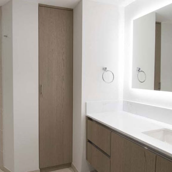 Thumbnail 4 of 7 a bathroom with a toilet and a sink and a shower at Wilshire Margot, Los Angeles, CA 90024
