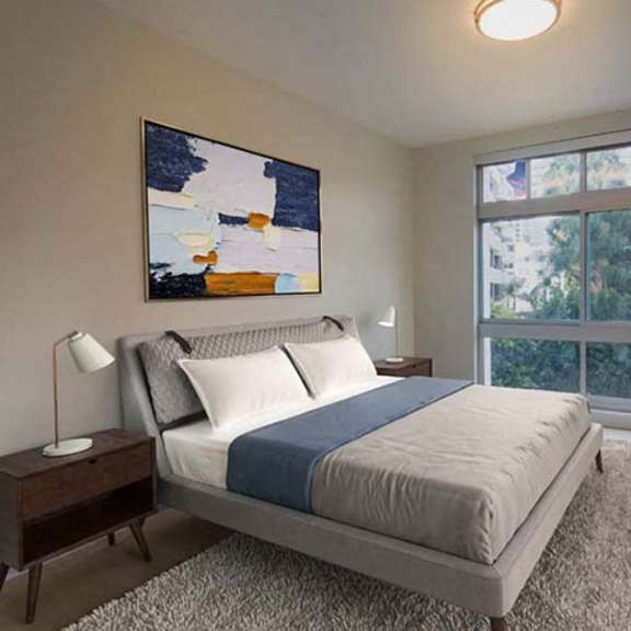Thumbnail 6 of 7 a bedroom with a bed and a large window at Wilshire Margot, Los Angeles