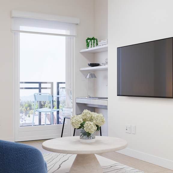 a living room with a flat screen tv mounted on the wall.