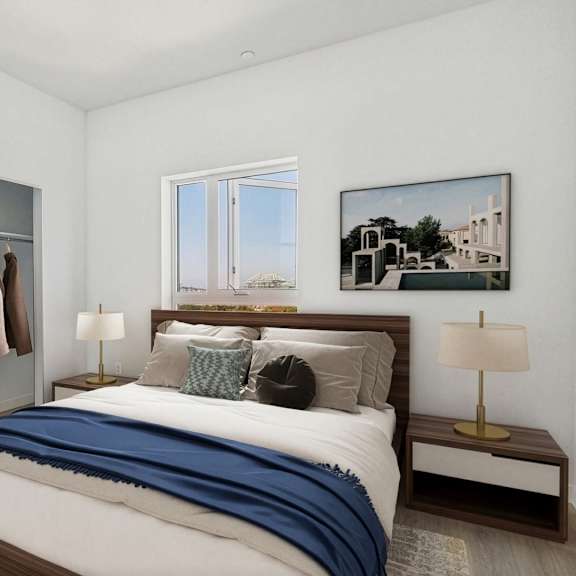 a bedroom with a bed, a bench, and a window.