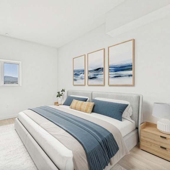 a bedroom with a large bed and a flat screen tv mounted on the wall.