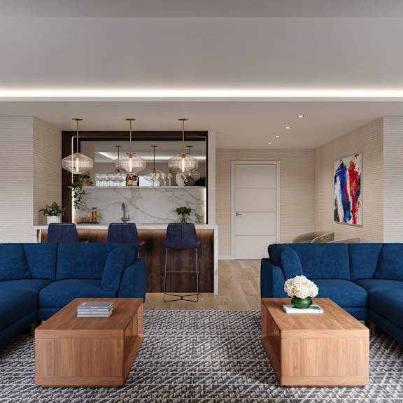 a modern living room with a blue sofa set and a wooden coffee table.