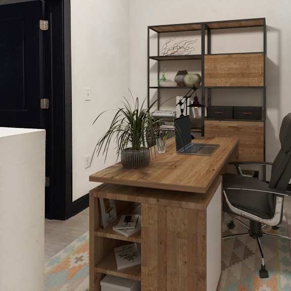 Thumbnail 5 of 7 A room with a desk and a chair.