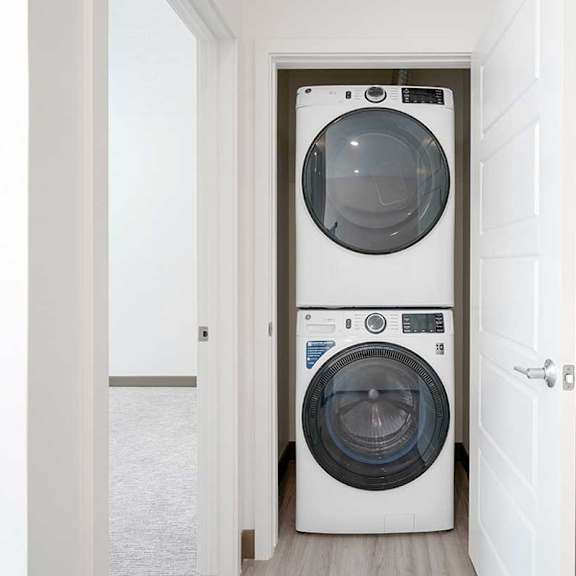 Thumbnail 29 of 29 a frontloading stackable washer and dryer in a closet