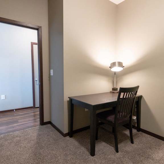 Thumbnail 18 of 19 Room with desk, chair and lamp at 360 at Jordan West in West Des Moines, IA