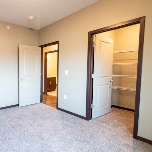 Thumbnail 11 of 18 Bedroom with attached walk in closet at 360 at Jordan West
