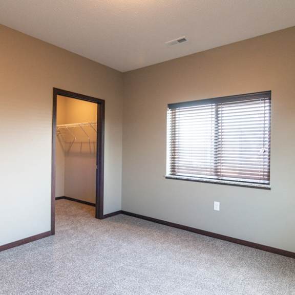 Thumbnail 13 of 18 Bedroom with attached walk in closet at 360 at Jordan West