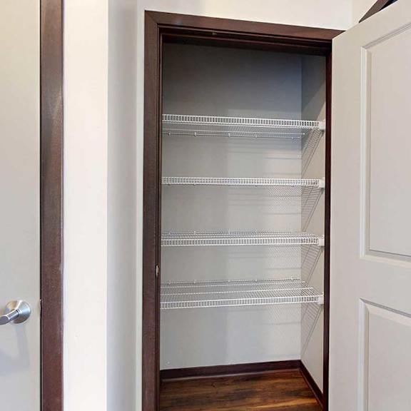 Thumbnail 4 of 29 A closet with built-in wire shelving.