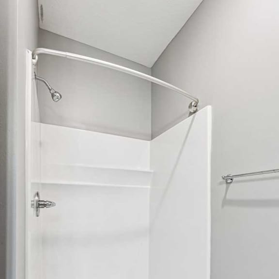 Thumbnail 15 of 15 A bathroom with a walk-in shower.