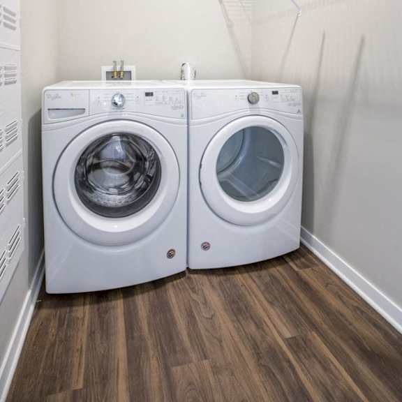 Thumbnail 12 of 12 Front loading washer and dryer in a laundry room