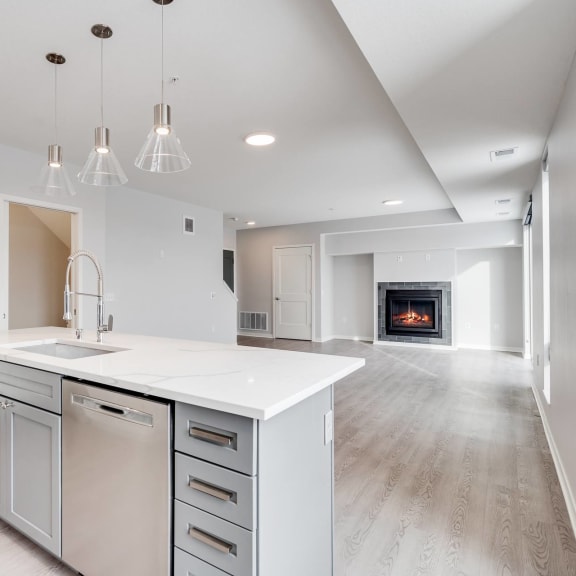 Thumbnail 5 of 16 Large kitchen island with granite countertops and dishwasher in island