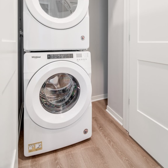 Thumbnail 12 of 13 Stacked front loading washer and dryer in a closet at Aspire at CityPlace in Woodbury MN 55125