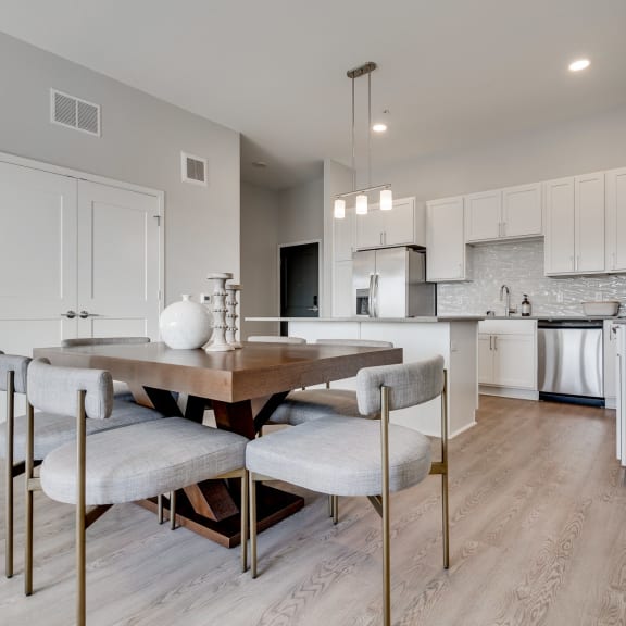 Thumbnail 5 of 15 Furnished dining area off of the luxury kitchen in two bedroom apartment in Woodbury MN 55125