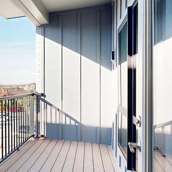 Thumbnail 11 of 28 a balcony with a black metal railing