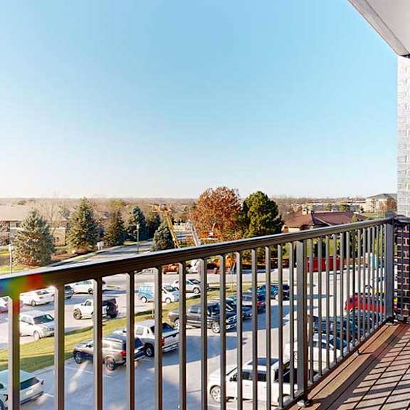 Thumbnail 12 of 30 a balcony with a metal railing