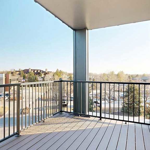 Thumbnail 12 of 33 a balcony with a metal railing and, a stunning view, and a window to the living roow