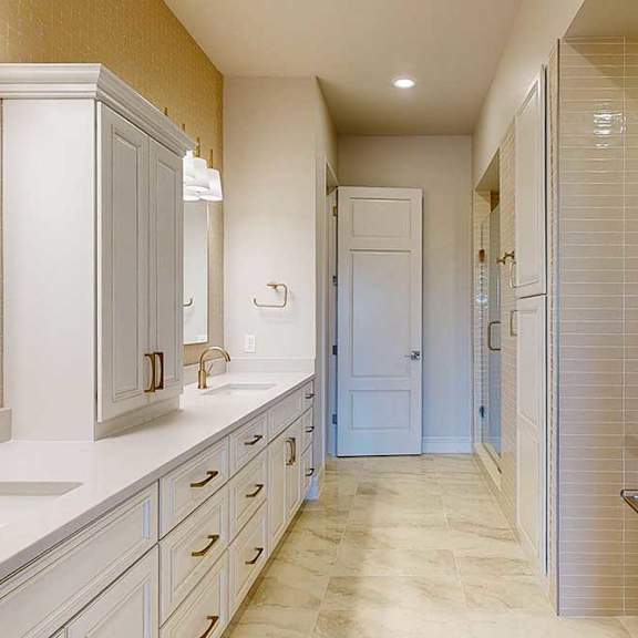 Thumbnail 21 of 31 Primary bathroom with upscale finishes and dual vanities
