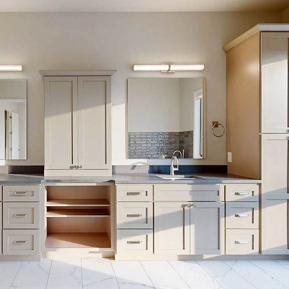 Thumbnail 36 of 41 A spacious ensuite bathroom featuring a quartz double vanity with taupe cabinetry, a tall storage cabinet, and tiled flooring.
