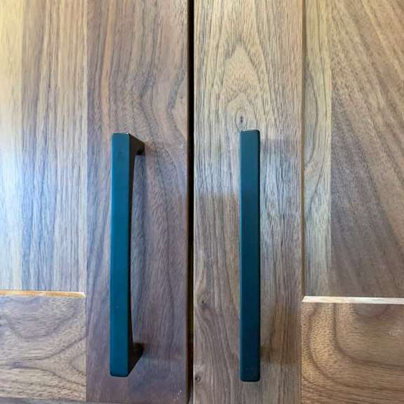 Thumbnail 4 of 26 matte black handles on the wooden cabinetry in the kitchen