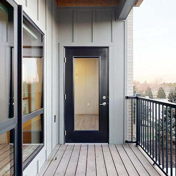 Thumbnail 13 of 26 a balcony with a window to the bedroom and a windowed door to the living room