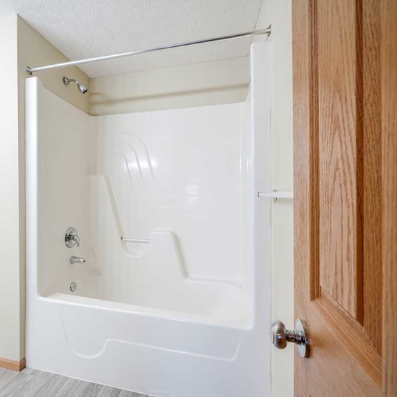 Thumbnail 18 of 26 a bathroom with a shower/tub