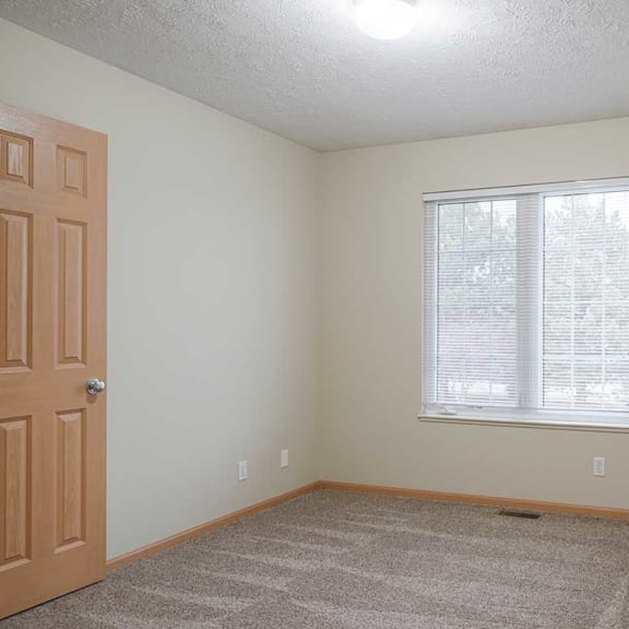 Thumbnail 20 of 26 the third bedroom featuring a large window