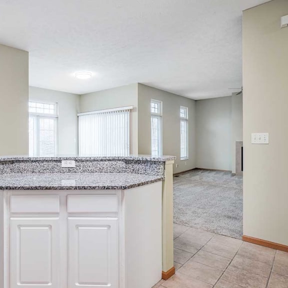 Thumbnail 11 of 26 a kitchen island with cabinet storage underneath