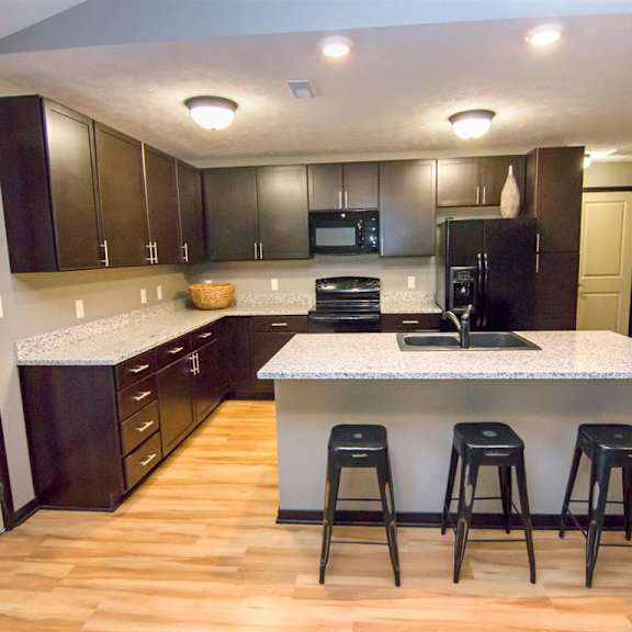 Thumbnail 5 of 13 Large kitchen with island at The Flats at 84 apartments in Lincoln NE